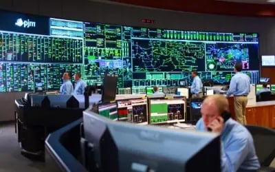 Members of PJM in action at their Advanced Control Center