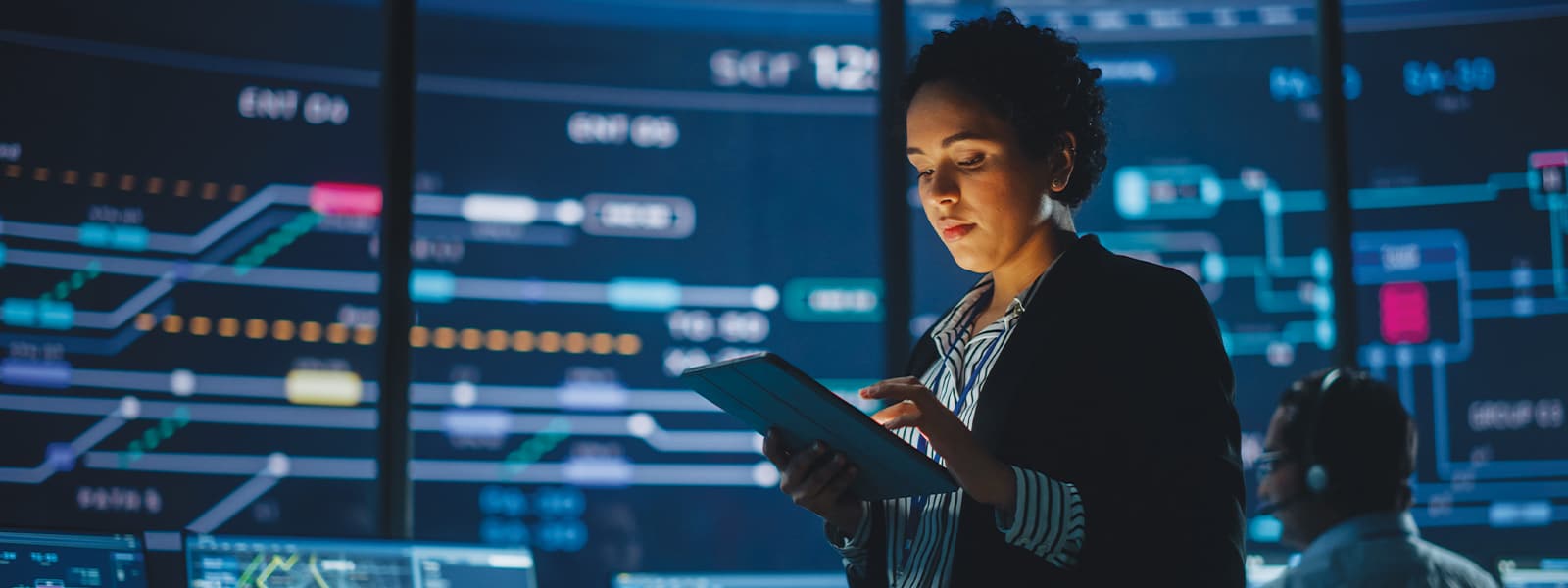 Woman data analytics control room